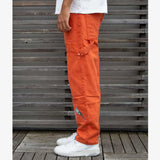 EMBROIDERED CARPENTER DENIM - BURNT ORANGE